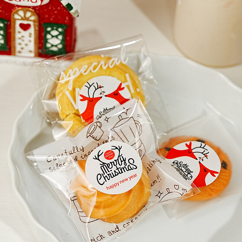 60 punase põhjapõdra jõulukleebist ümmargused sildid 3 cm