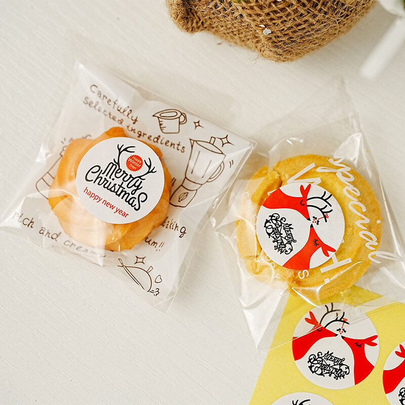 60 punase põhjapõdra jõulukleebist ümmargused sildid 3 cm