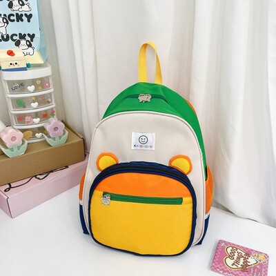 Lasteaia algklassiõpilase koolikott armas multikas armas karupoisi ja tüdruku seljakott