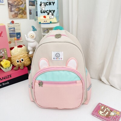 Lasteaia algklassiõpilase koolikott armas multikas armas karupoisi ja tüdruku seljakott