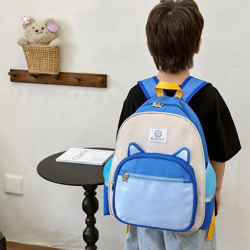 Lasteaia algklassiõpilase koolikott armas multikas armas karupoisi ja tüdruku seljakott