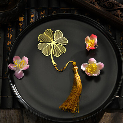 Peened õõnsad metallist järjehoidjad kullavärvi lehtede veeni lootose kujuga raamatumärgid tutiga kirjatarvetega õpilaste lugemistarvetega