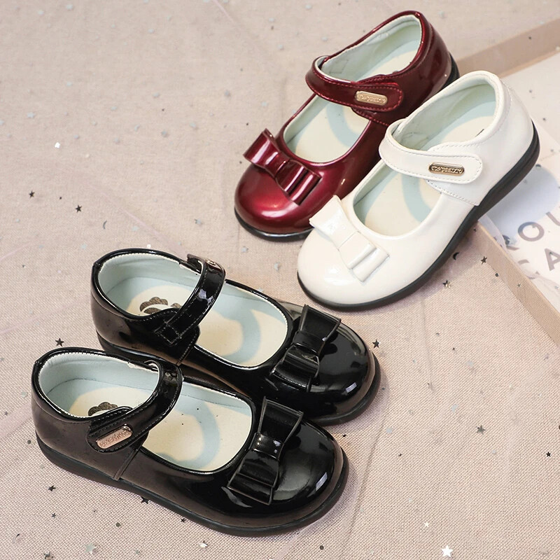 Tüdrukute nahast jalatsid peopulmadeks, ühevärvilised lasteprintsesside esituskingad vöörisõlmega Ühendkuningriigi laste koolikingad