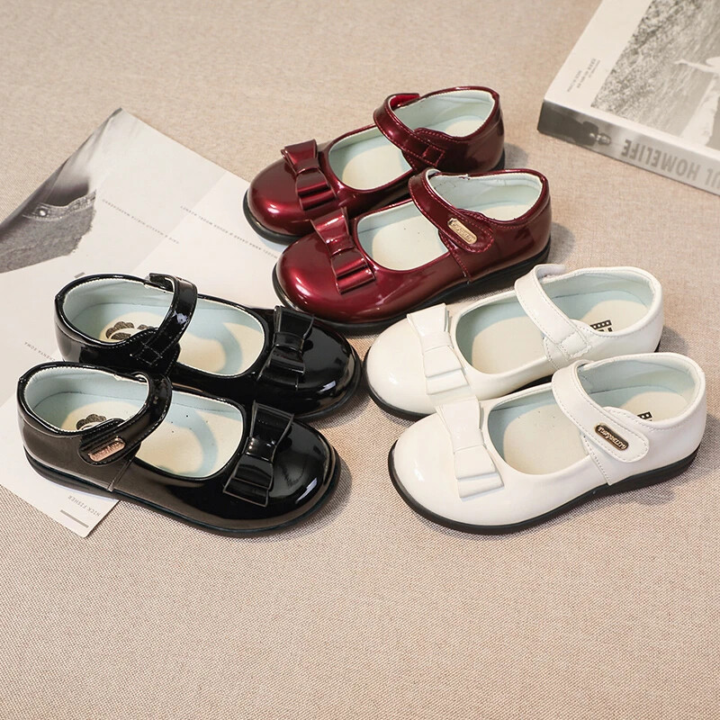 Tüdrukute nahast jalatsid peopulmadeks, ühevärvilised lasteprintsesside esituskingad vöörisõlmega Ühendkuningriigi laste koolikingad