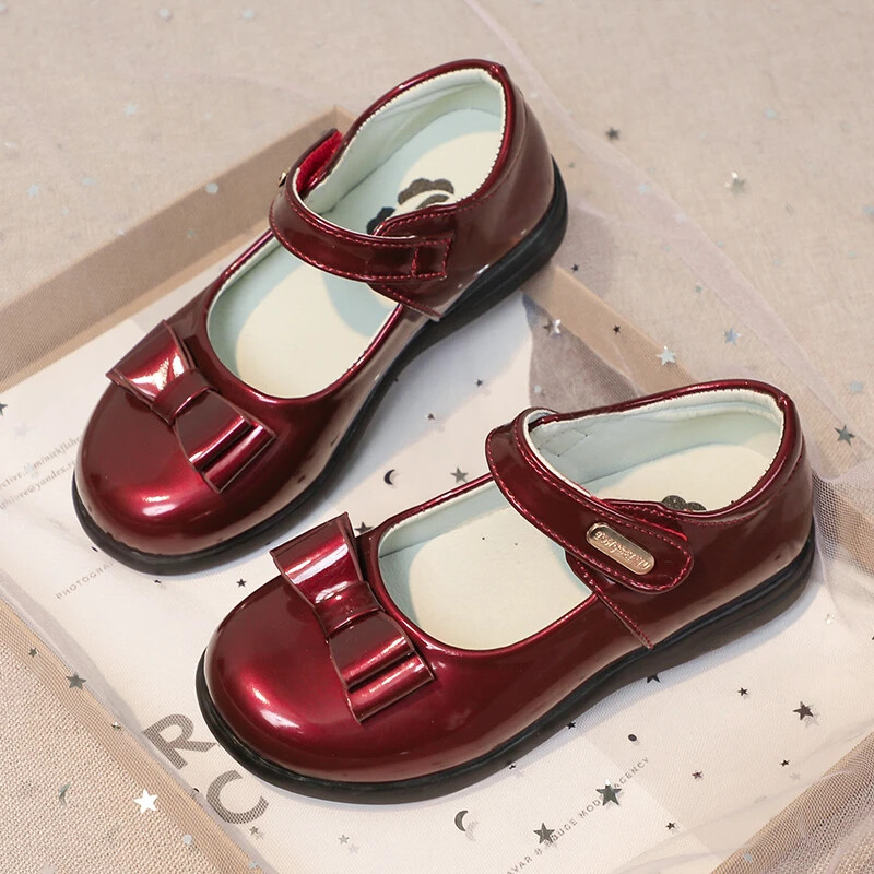 Tüdrukute nahast jalatsid peopulmadeks, ühevärvilised lasteprintsesside esituskingad vöörisõlmega Ühendkuningriigi laste koolikingad