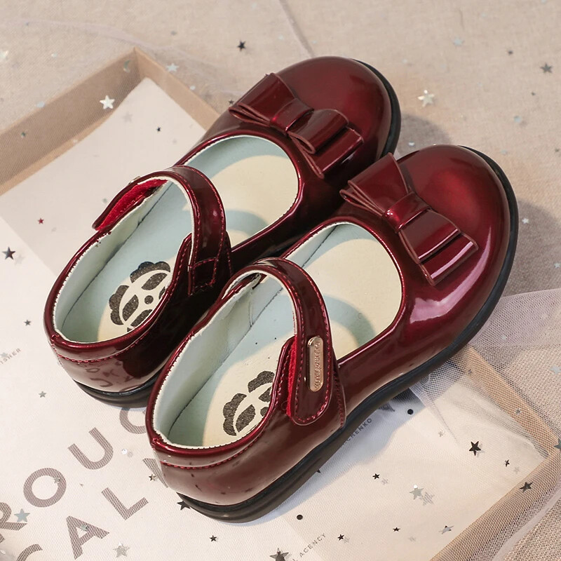 Tüdrukute nahast jalatsid peopulmadeks, ühevärvilised lasteprintsesside esituskingad vöörisõlmega Ühendkuningriigi laste koolikingad