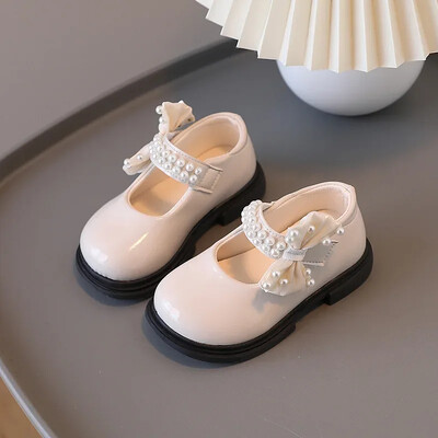 Tüdrukute uus lakk, pehme tald pärl vibu madala suu printsess ühe kingaga laste vaba aja spordi libisemisvastane väike nahk