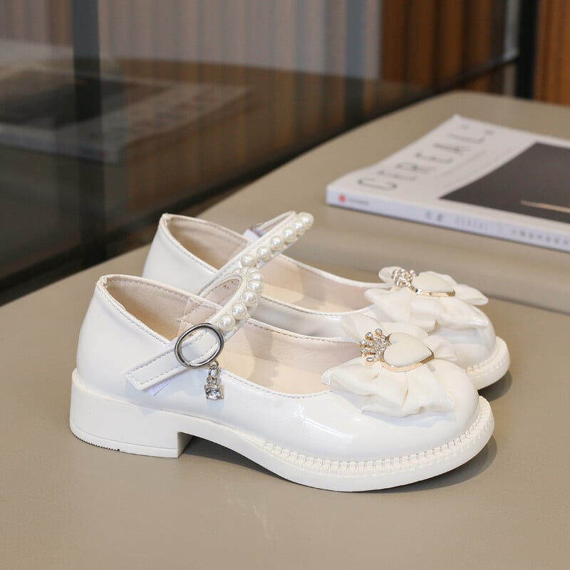 Armsad laste printsessikingad 2024 Elegantne Love Crown Bowknot Laste nahast kingad Mood šikid tüdrukute pärlitega üksikud kingad Mary Janes