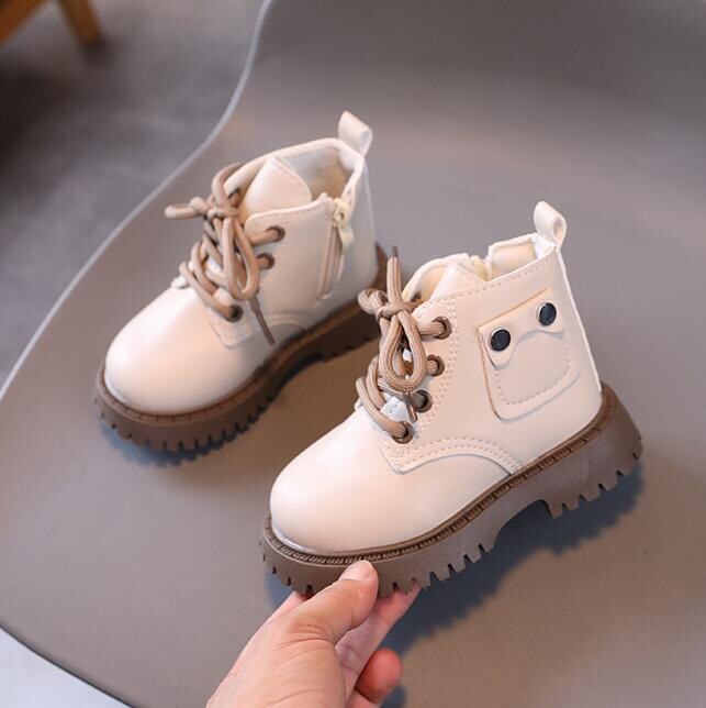 Sügistalv Laste vabaajasaapad Pehmed soojad puuvillased lumekingad Nahk veekindlad lapsed mood lumesaapad Sporditossud