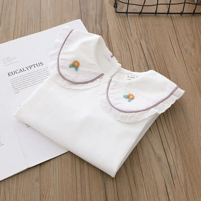 Laste pikkade varrukatega kihiline T-särk sügisstiilis tikandiga valge särk, väike revääriga nukutopp tüdrukutele kuni 10. eluaastani