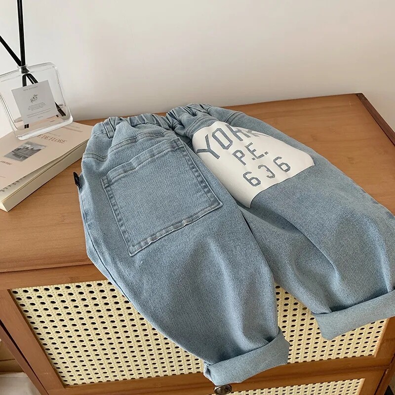 Laste sügispüksid teksapüksid uus Korea väljaanne poistele ja tüdrukutele kevadpüksid lastele lahedad vabaaja teksapüksid