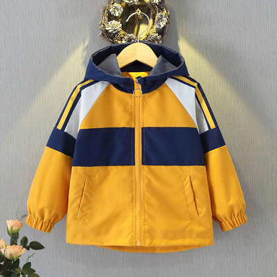 Mugav ja stiilne tõmblukuga kapuutsiga jope nahast sildikaruga poistele ja tüdrukutele – kevad- ja sügisene tuulejope välitingimustes