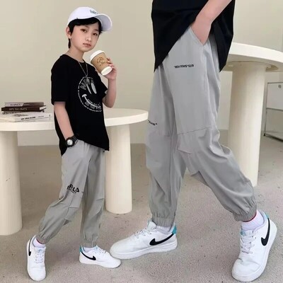 Suvised vabaaja püksid poisid Lapsed Jääsiid, õhuke stiil Keskmiselt lahti hingav kiiresti kuivav elastne sääsevastased pikad püksid trendikas