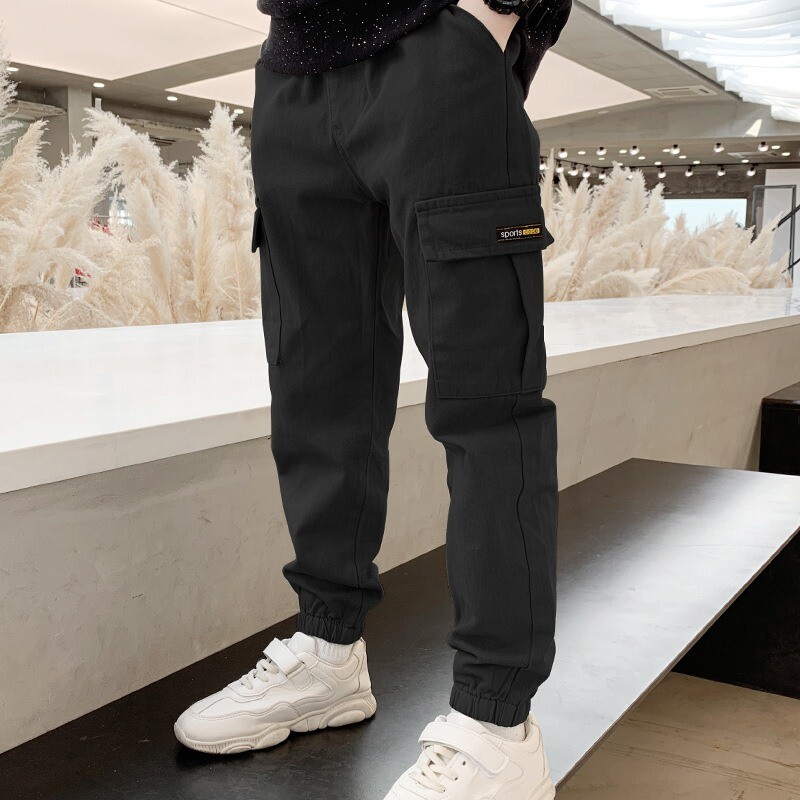 Nove dječje hlače Jednobojne pamučne kargo hlače s elastičnim strukom s džepovima Elegantne ležerne sportske hlače za dječake Dječje hlače ugodne za kožu