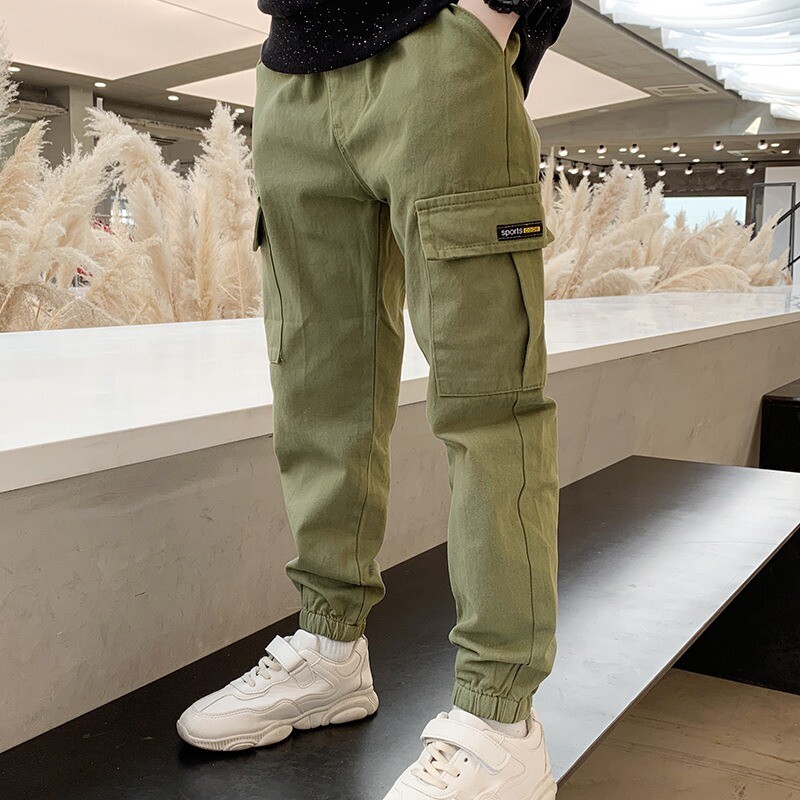 Nove dječje hlače Jednobojne pamučne kargo hlače s elastičnim strukom s džepovima Elegantne ležerne sportske hlače za dječake Dječje hlače ugodne za kožu