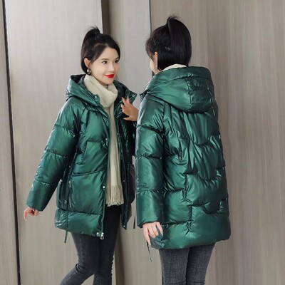 Topli kaput 5XL Nova zimska sjajna jakna za 2022. Korejski labavi kaput s kapuljačom i podstavljenim pamukom Deblja ženska parka Jednobojna ležerna gornja odjeća