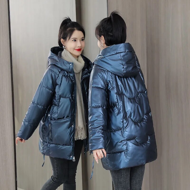 Topli kaput 5XL Nova zimska sjajna jakna za 2022. Korejski labavi kaput s kapuljačom i podstavljenim pamukom Deblja ženska parka Jednobojna ležerna gornja odjeća