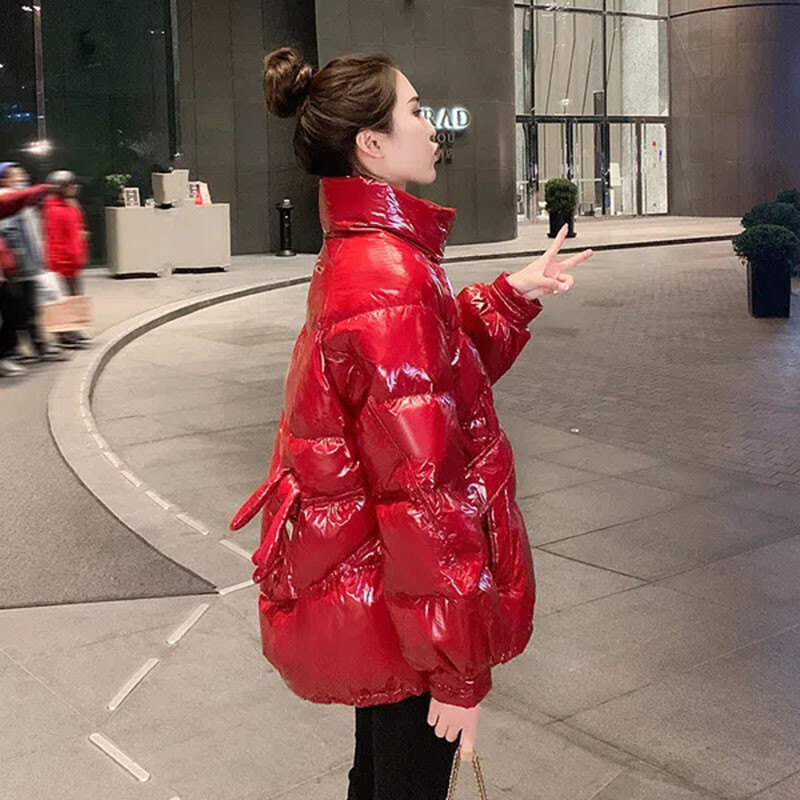 Ühekordselt kasutatav läikiv sulepolsterdatud jakk naiste keskmise pikkusega 2024, uus talvine vaba ühevärviline moodne naiste stiil, mida ületada