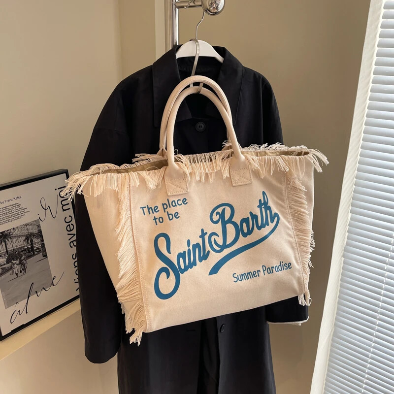 Ženska torba visokog kapaciteta 2024., popularno prodavana platnena jednobojna modna torba na rame, spojena s resicama, visokokvalitetna ručna torba