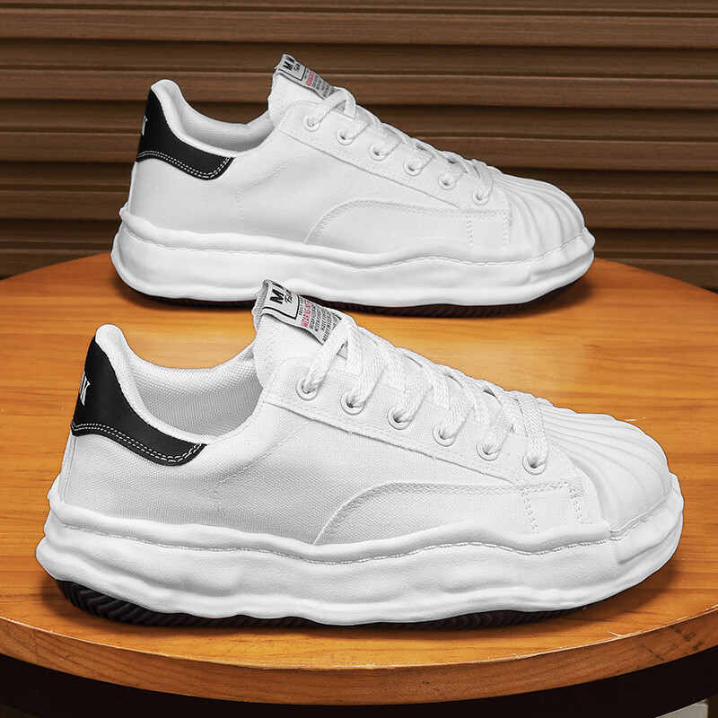 Meeste paksu tallaga lõuendist spordijalatsid madala lõikega vabaajaspordijalatsid, moekad ja mitmekülgsed polsterdatud meeste vabaaja spordijalatsid