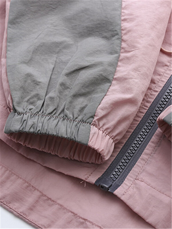 Suures suuruses naisterõivad suvine õhuke vabaaja jope, kontrastvärvi, blokeeritud kapuutsiga lukuga jakk ja vöökohal on pingutusnöör