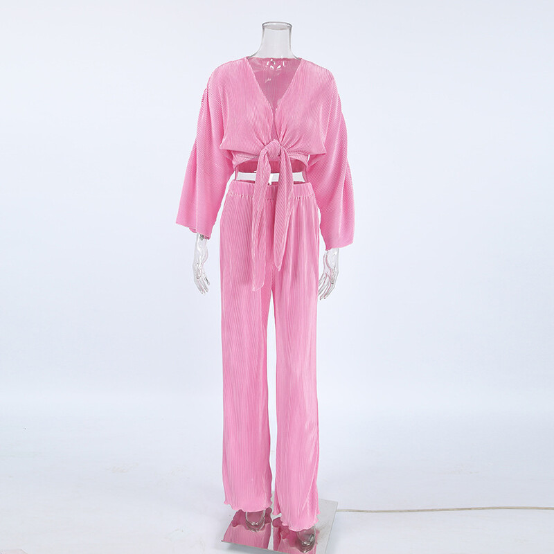 Risti V-kaelusega särgid ja plisseeritud püksid, kaheosalised komplektid naistele 2024. aasta sügisene plisseeritud vaba puhkuseriietus Naiste roosad pükste komplektid