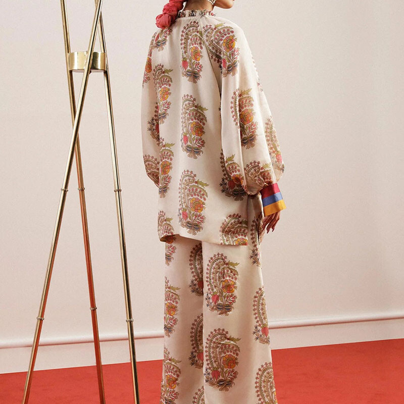 V-kaelusega laternaga varrukatega ülaosa ja pikkade pükstega ülikond Elegantsed lahtised kommunikatsioonikomplektid 2024. aasta sügis, uue mustriga trükitud naiste komplektid