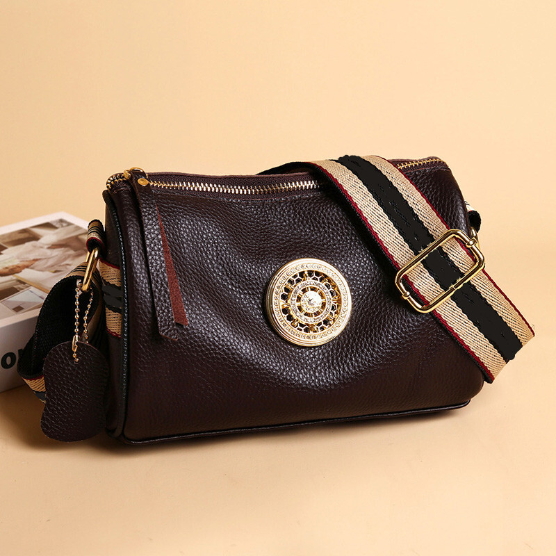 Ženske ručne torbe od prave kože Dizajnerske rotirajuće metalne brave Ženske torbe na rame Modni novi luksuzni brend Ženska kurirska torba