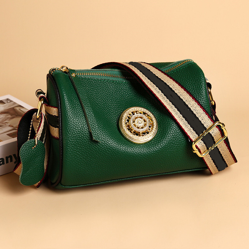 Ženske ručne torbe od prave kože Dizajnerske rotirajuće metalne brave Ženske torbe na rame Modni novi luksuzni brend Ženska kurirska torba