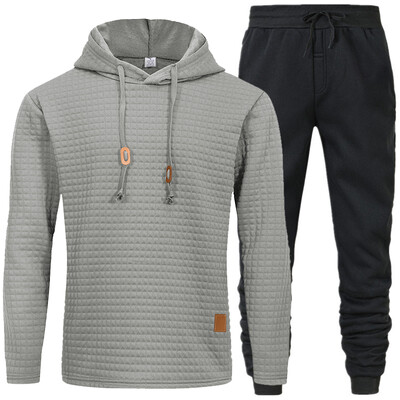 Άνετο σετ ανδρικό παντελόνι με κουκούλα με υφή με κορδόνι για μονόχρωμα αθλητικά ρούχα με μακρυμάνικο χρώμα