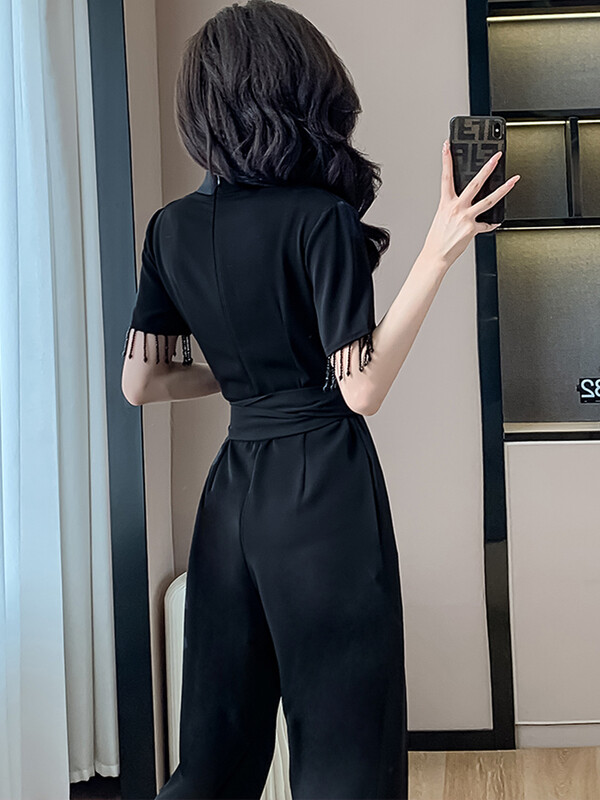 Ljeto 2024. Elegantni ženski uredski crni kombinezoni za žene s V-izrezom s resicama kratkih rukava Ležerne kratke hlače visokog struka širokih nogavica