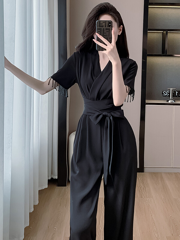 Ljeto 2024. Elegantni ženski uredski crni kombinezoni za žene s V-izrezom s resicama kratkih rukava Ležerne kratke hlače visokog struka širokih nogavica