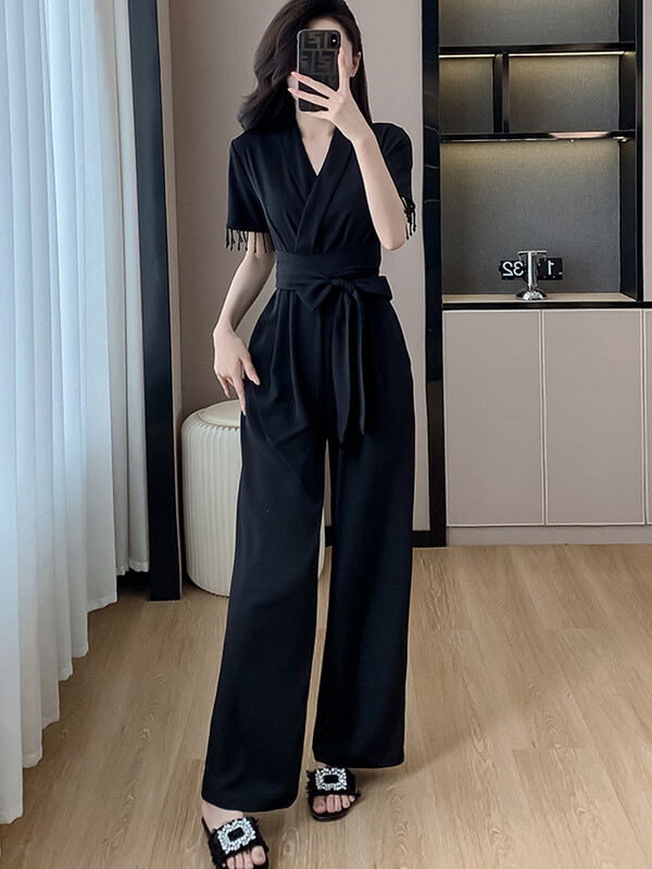 Ljeto 2024. Elegantni ženski uredski crni kombinezoni za žene s V-izrezom s resicama kratkih rukava Ležerne kratke hlače visokog struka širokih nogavica