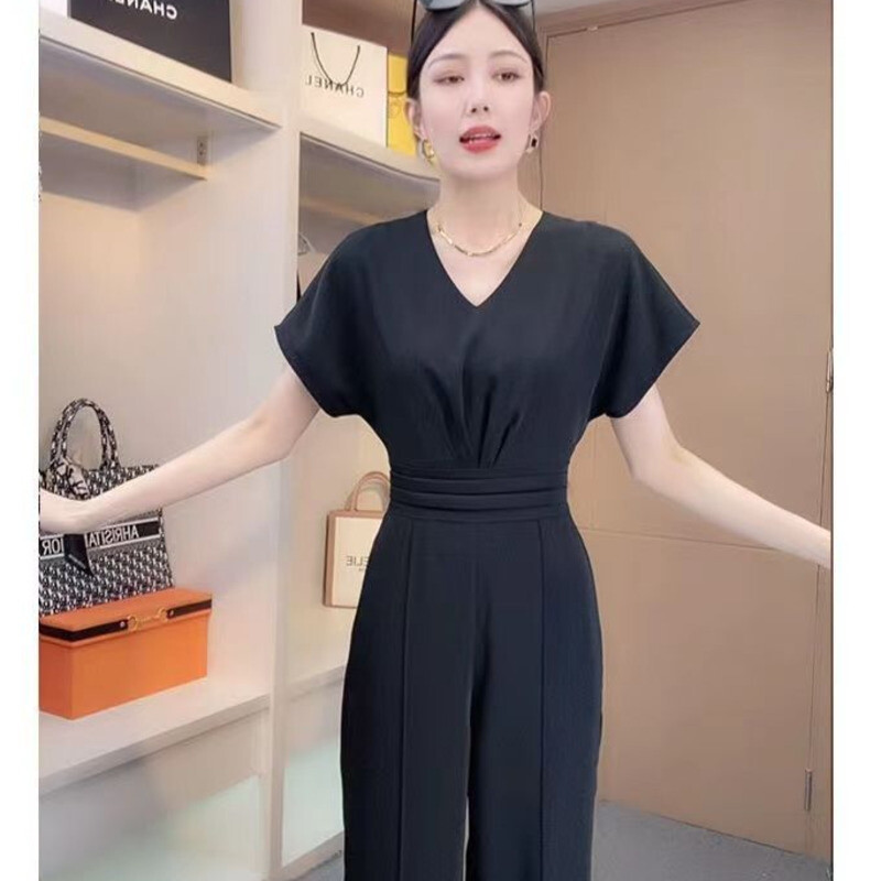 Ljeto 2023. Novi ženski modni kombinezoni Široki V-izrez kratkih rukava Crni kombinezoni za žene Kombinezon