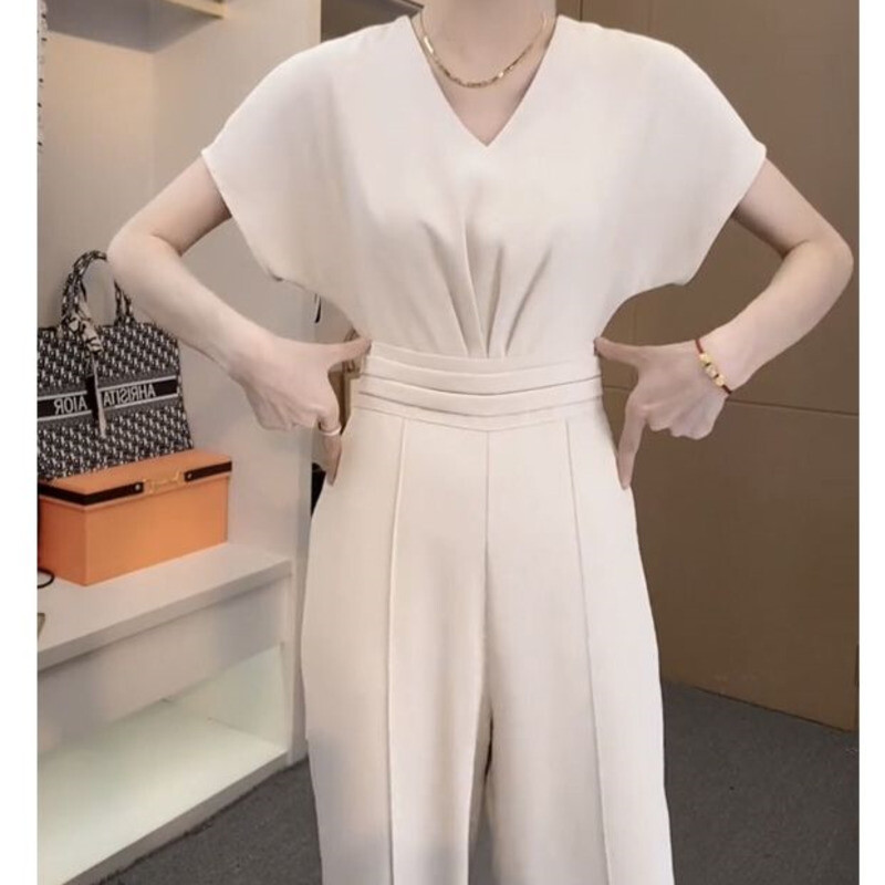 Ljeto 2023. Novi ženski modni kombinezoni Široki V-izrez kratkih rukava Crni kombinezoni za žene Kombinezon