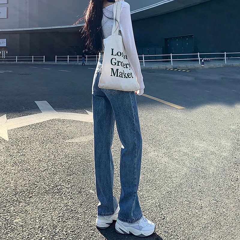 Kõrge vöökohaga teksad, naised