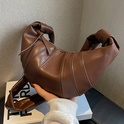 Mekana kožna polumjesečeva torba za knedle vrhunske kvalitete za žene 2024. Nova modna luksuzna dizajnerska ručna torba Ženska skitnica torba na rame