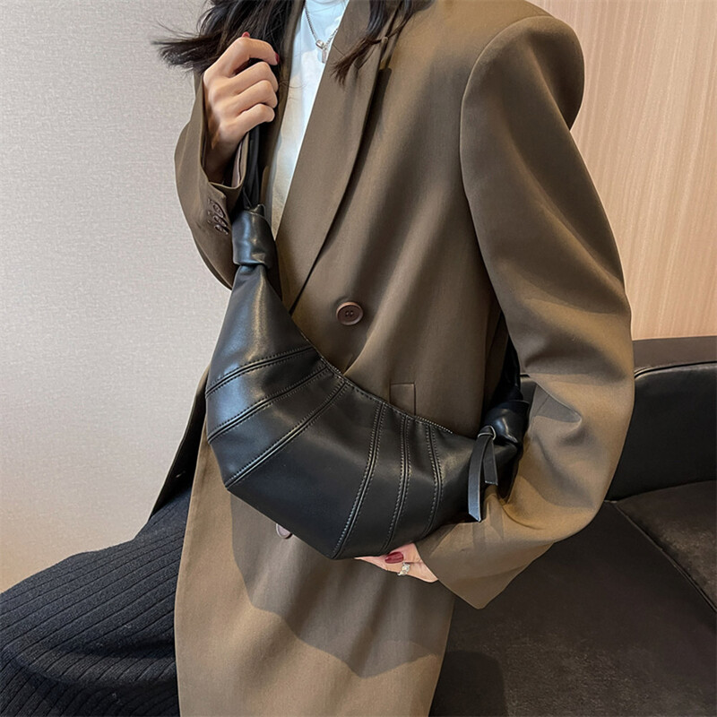 Mekana kožna polumjesečeva torba za knedle vrhunske kvalitete za žene 2024. Nova modna luksuzna dizajnerska ručna torba Ženska skitnica torba na rame