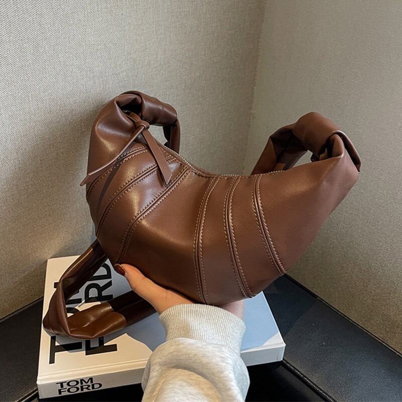 Mekana kožna polumjesečeva torba za knedle vrhunske kvalitete za žene 2024. Nova modna luksuzna dizajnerska ručna torba Ženska skitnica torba na rame