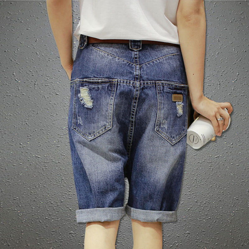 Moteriški džinsiniai džinsai kryžminės kelnės Madingi žemai nuleidžiami tarpkojo trumpi džinsai hip-hop punk stilius.
