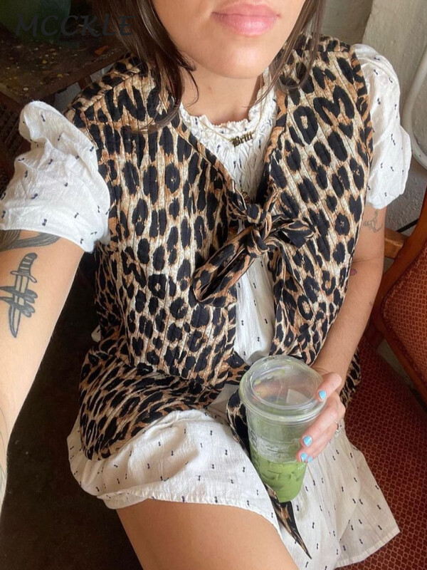 Leopardimustriline vibu, pits-up vest, naiste vaba varrukateta V-kaelusega 2024. aasta kevadmood naiste kontorirõivad.