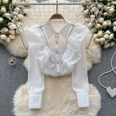 XFPV Γυναικεία ελαφριά βολάν πολυτελείας ιδιοσυγκρασιακή μπλούζα πέτο μακρυμάνικα ελαφριά φαρδιά πουκάμισα Άνοιξη Καλοκαίρι 2024 SM10962