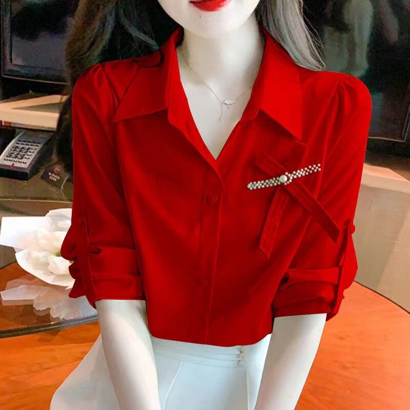 Modna košulja s reverom s dugmadima za sve kombinacije Ženska odjeća Ljeto 2023. Novi ležerni gornji dijelovi Široka mašna s perlama Slatka bluza