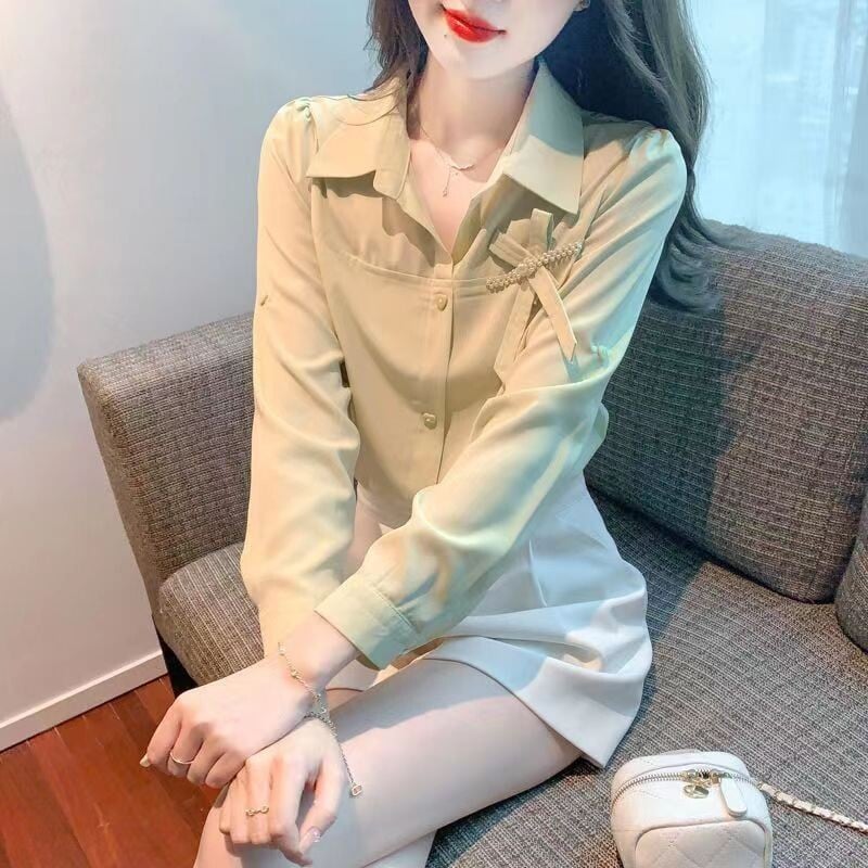 Modna košulja s reverom s dugmadima za sve kombinacije Ženska odjeća Ljeto 2023. Novi ležerni gornji dijelovi Široka mašna s perlama Slatka bluza