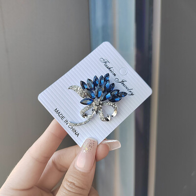 Νέο πολυτελές σχέδιο μπλε κρυστάλλινε καρφίτσες για γυναίκες με ένθετες καρφίτσες από στρας Κοσμήματα Αξεσουάρ ρούχων Δώρο