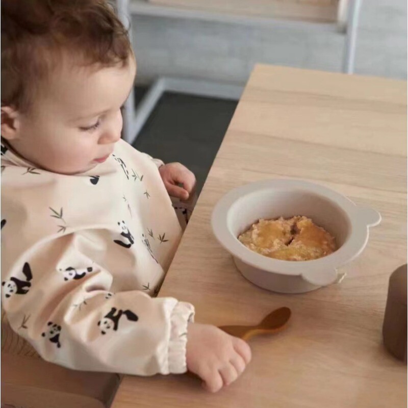 Jauni bērnu barošanas priekšauti ar garām piedurknēm bērnu priekšauti ar kabatu, pilnībā nosedzāmu bērnu kleitu ar maisiņu, ūdensnecaurlaidīgs, garām piedurknēm