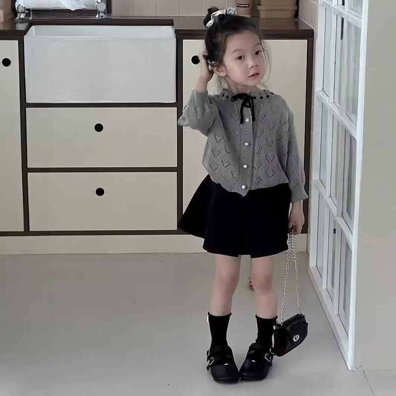 Džemper Djevojčica Korejski slatki jasen Izdubljeno pletenje Puf rukavi za bebe Jednostavna moda 2024. Široka dječja odjeća na pruge