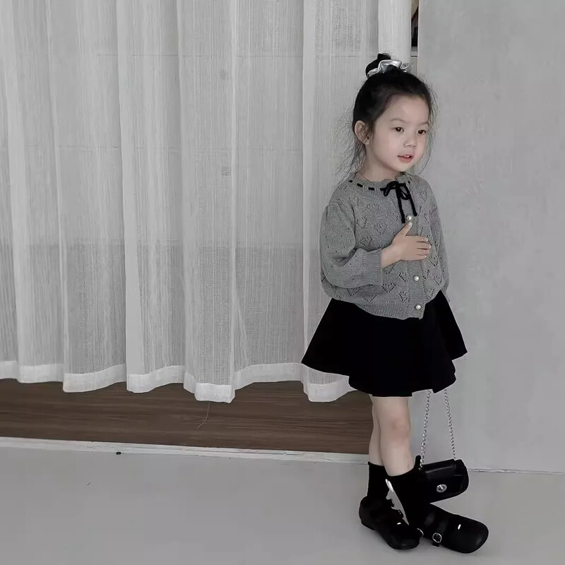 Džemper Djevojčica Korejski slatki jasen Izdubljeno pletenje Puf rukavi za bebe Jednostavna moda 2024. Široka dječja odjeća na pruge