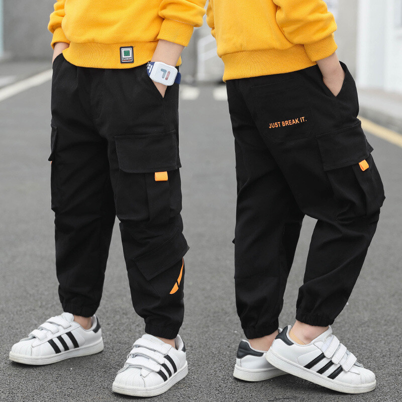 Külkereskedelmi forrón eladó alkalmi gyerek nadrágok, tavaszi és őszi fiúnadrágok, közepes és nagy gyerekek háromdimenziós zsebes gyerekoverallok, gyerekruha dropshipping