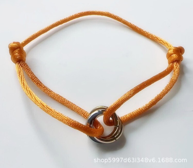 Határokon átnyúló legkelendőbb háromgyűrűs piros kötél karkötő pároknak, könnyű luxus résbe fonott karkötő, egyszerű férfi ékszerek
